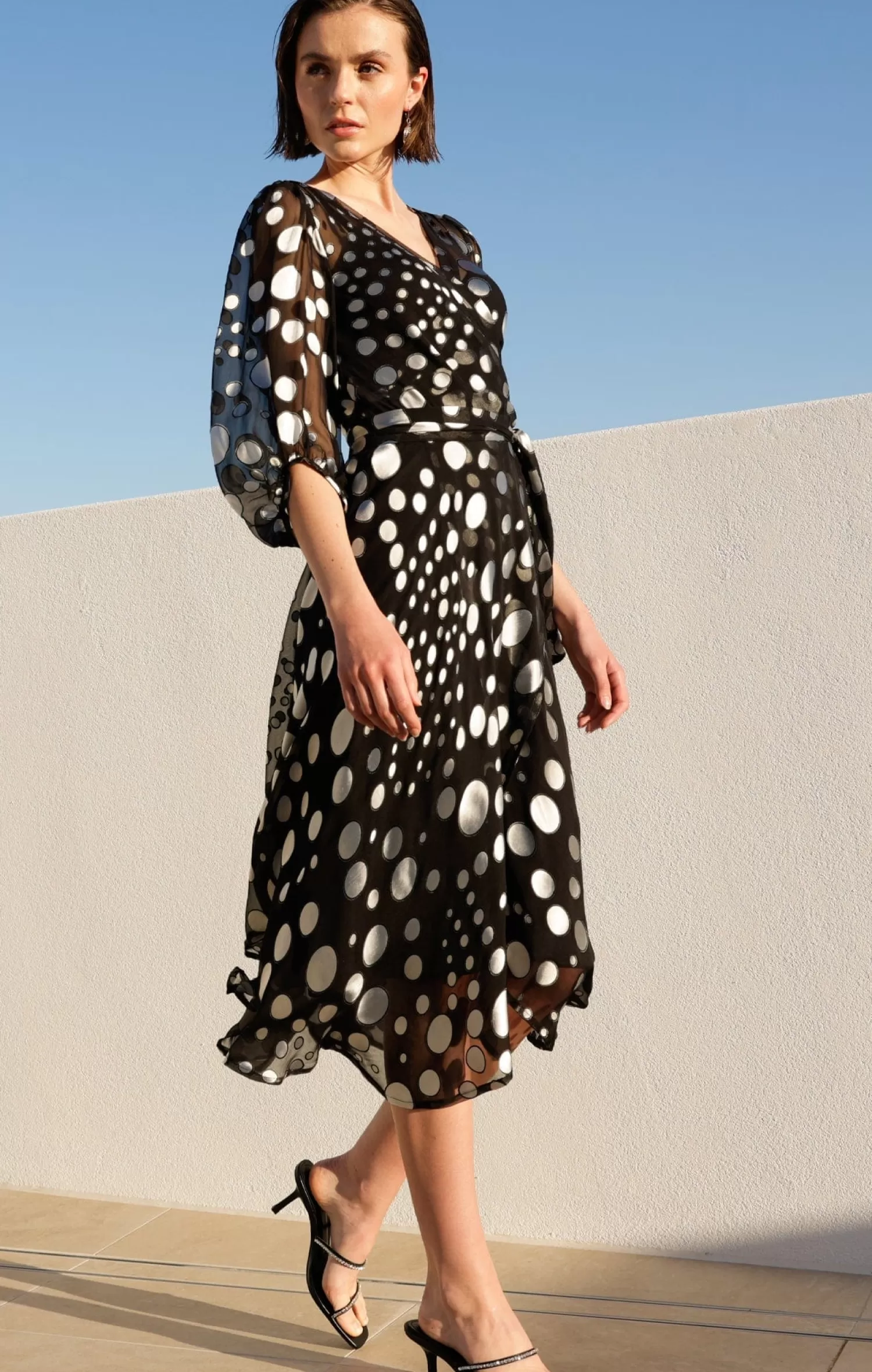 SACHA DRAKE WONDERLAND MIDI WRAP DRESS IN BLACK SILVER SPOT